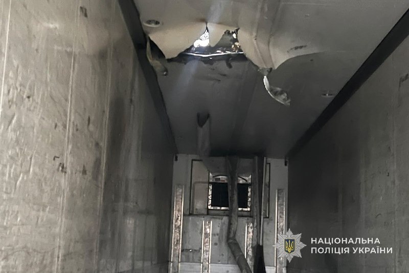Rescuers work at the site of a shelling in the Sumy region
