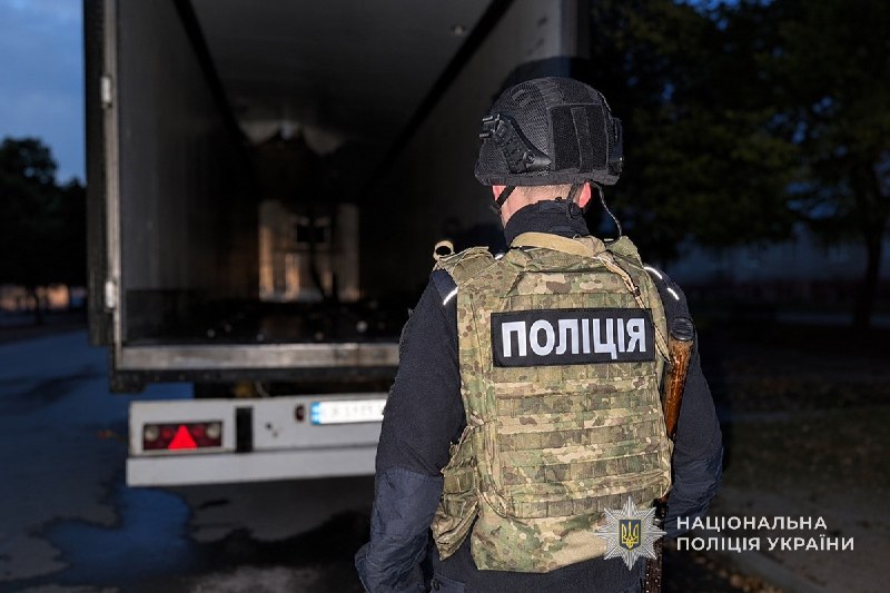 Rescuers work at the site of a shelling in the Sumy region