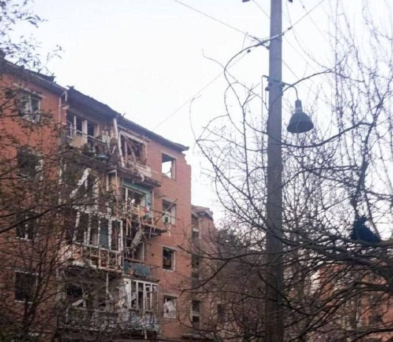 Rescuers work at the site of a missile strike on a residential building in Pryluky