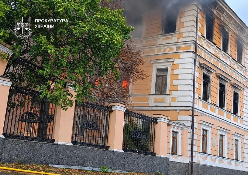 Rescuers work at the site of a drone strike on the National Academy of Sciences of Ukraine building in Kyiv