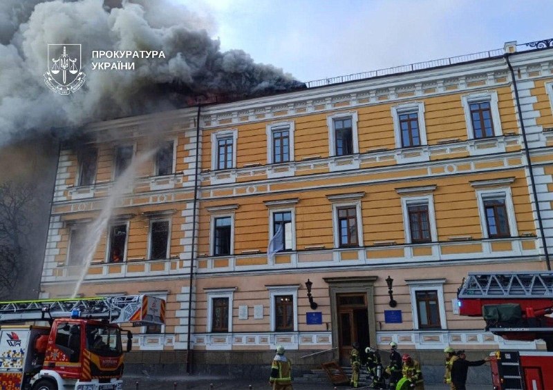 Rescuers work at the site of a drone strike on the National Academy of Sciences of Ukraine building in Kyiv