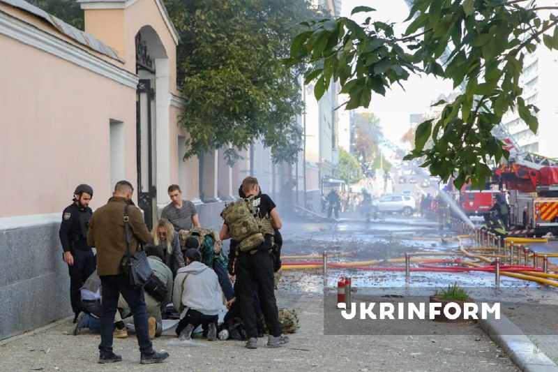 Rescuers work at the site of a drone strike on the National Academy of Sciences of Ukraine building in Kyiv
