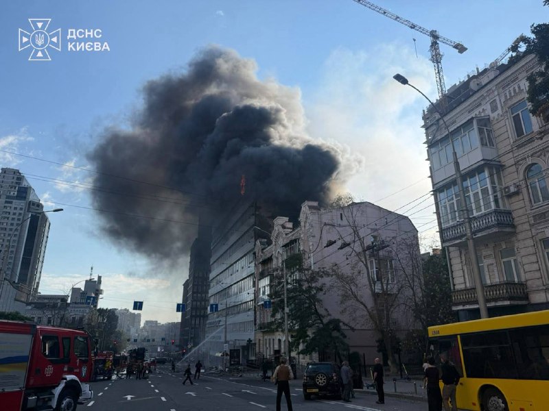 Rescuers work at the site of a drone strike on the National Academy of Sciences of Ukraine building in Kyiv