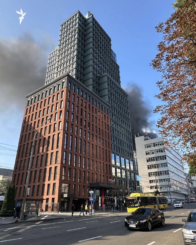 Rescuers work at the site of a drone strike on the National Academy of Sciences of Ukraine building in Kyiv